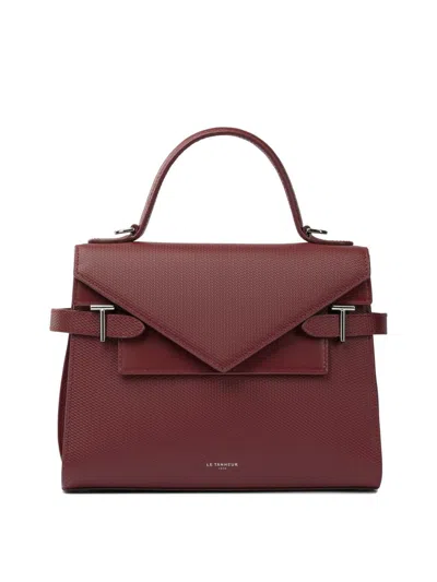 Le Tanneur Handbags In Red