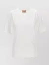 Le Twins Gianna V Neck Short Sleeve Top In White