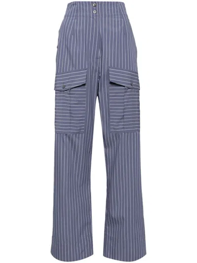 Lee Mathews Heath Trousers In Blue