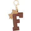 Leith Bow Initial Bag Charm In Brown