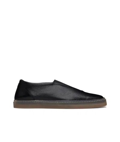 LEMAIRE A PAIR OF SNEAKERS