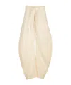 Lemaire Belted Tapered-leg Trousers In Nude