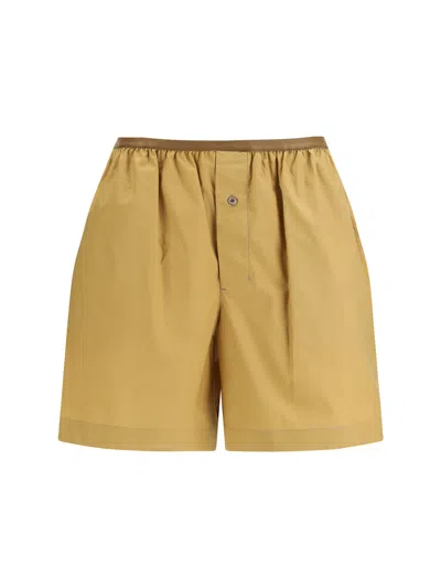 Lemaire Buttoned Elasticated Shorts In Gold