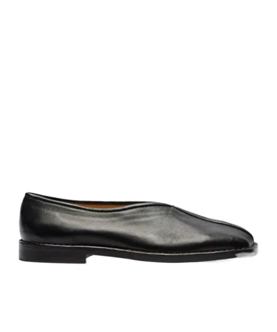 Lemaire Piped Leather Slip-on Shoes In Black