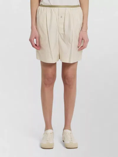 Lemaire Relaxed Mid Rise Cotton Silk Shorts In Gold