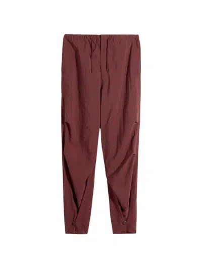 Lemaire Stitched Pleats Parachute Trousers In Red