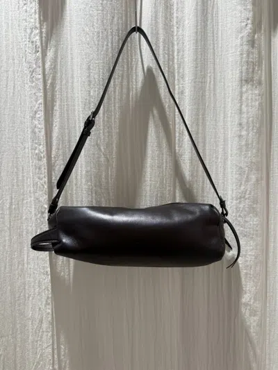 Lemaire The Care Slingbag In Dark Chocolate