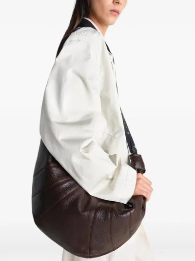Lemaire Western Studs Croissant Backpack In Brown