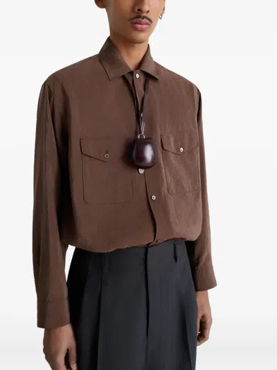 Lemaire X Carlos Penãfiel Castanet-shaped Leather Coin Purse In Brown