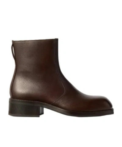 Lemaire Zipped Ankle Boots In Shiny Leather In Brown