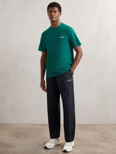 Les Deux Dark Navy  Technical Logo Joggers In Green