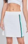 L'etoile Sport Golf Side Zip Skort In White With Navy & Green