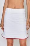 L'etoile Sport Side Snap Skort In White With Red Trim