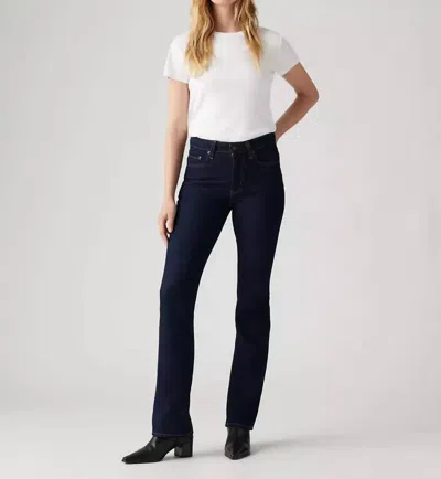 Levi's Dark Wash Cotton 724 High Rise Straight Jeans In Blue