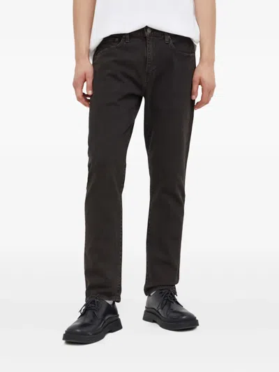 Levi's 502™ Taper Jeans In Black