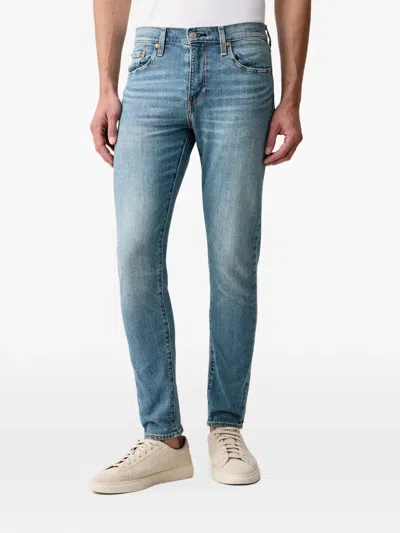 Levi's 512 Faded-effect Slim-fit Jeans In Blue
