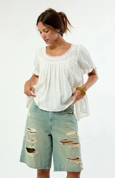 Levi's Women's Light Blue Ripped Middy Jorts In Light Indigo In Purple