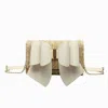 Like Dreams Women's Bonnie Straw Wallet Bowtie Crossbody Bag In White In Gold