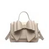 Like Dreams Women's Jasmine Bow Vegan Crossbody Bag In Beige In Sand