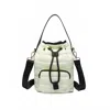 Like Dreams Women's Lucky Quilted Puffer Bucket Crossbody Bag In Ivory In Multi