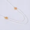 Lila Rasa Women's Gold / White Clover Long Pearl Statement Necklace 25"