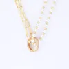 Lila Rasa Women's Gold / White Pearl Link Choker With Oval Cz Loop