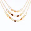 Lila Rasa Women's White / Brown / Gold Earthy Tone Triple Layer Necklace