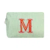 Lilly Loves Green M Alphabet Cosmetic Bag In Green