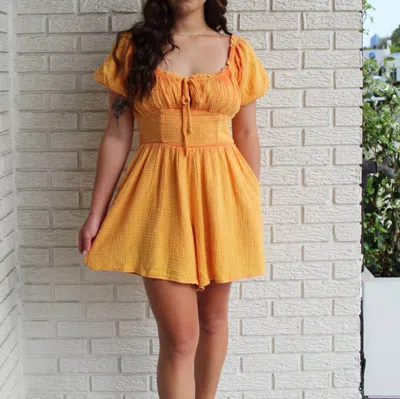 Lily Grace Washed Romper In Orange