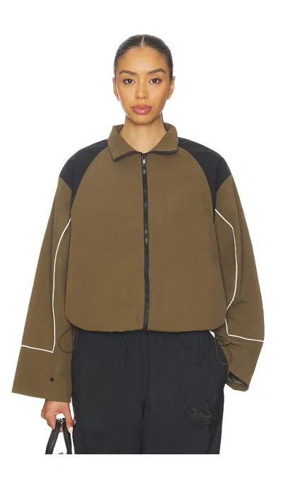 Lioness Shoreline Windbreaker In Brown