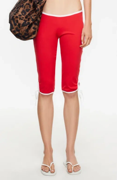 Lioness Sunset Low Rise Capri Leggings In Red