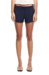 Shop Lioness Twilight Stripe Low Rise Nylon Shorts In Midnight