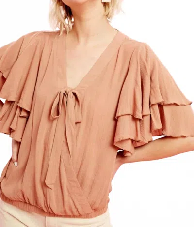 Listicle Delhi Flutter Sleeve Wrap Blouse In Brown In Pink
