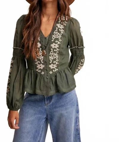 Listicle Embroidered Peplum Blouse In Deep Green In Yellow