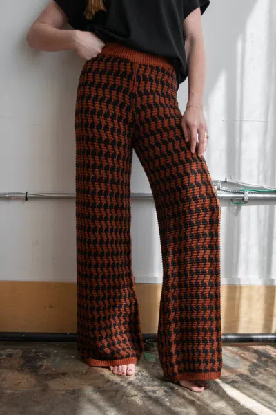Little Lies Houndstooth Pant In Brick And Black In Brown