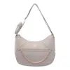 Liu •jo Crossbody Bag With Adjustable Strap And Chain Detail In Beige