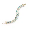 Liv Oliver 18k Gold Multi Row Turquoise & Blue Topaz Multi Gemstone Bracelet In Gold
