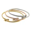 Liv Oliver Multi Tri Color Textured Wrap Bangle Set In Gold