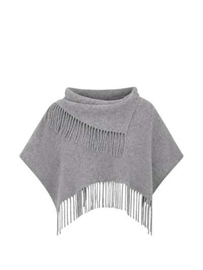 Liviana Conti Fringe-trim Asymmetric Poncho In Gold