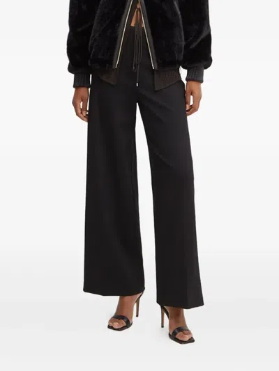 Liviana Conti Front-crease Zipped Trousers In Black
