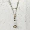Livvie + Hazel Jewelry Starflower Diffuser Essential Oil Locket Necklace In Brass In Multi