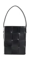 Loeffler Randall Laith Wide Woven Top Handle Bucket Bag Black In Black
