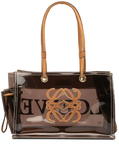 Pre-owned Loewe 2000-2020 Pvc And Leather Anagram Tote Bag In Brown