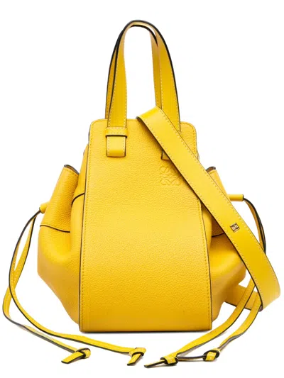 Pre-owned Loewe 2010-2025 Small Grained Calfskin Drawstring Hammock Satchel In Yellow