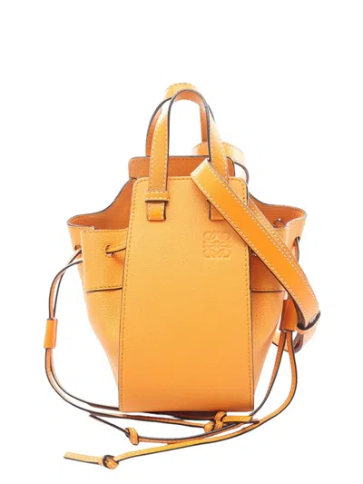Pre-owned Loewe 2010-2026 Mini Grained Calfskin Drawstring Hammock Bag Satchel In Orange