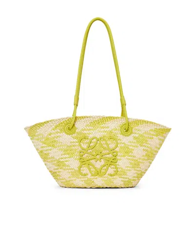 Loewe Small Anagram Basket Bag In Iraca Palm And Calfskin In Yellow