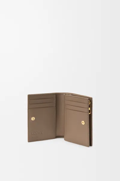 Loewe Anagram Compact Wallet In Pebble Grained Leather Skin For Woman In Brown