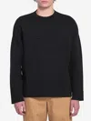 Loewe Relaxed Fit Crewneck Sweater With Embossed Logo In Black