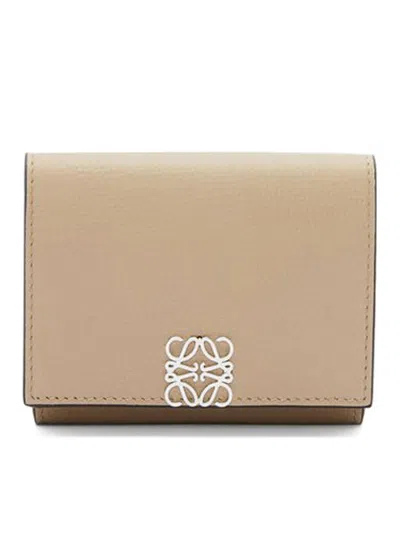 Loewe Anagram Trifold Wallet In Pebble Grain Calfskin In Nude & Neutrals