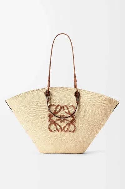 Loewe Anagram Woven Tote Bag In Tan